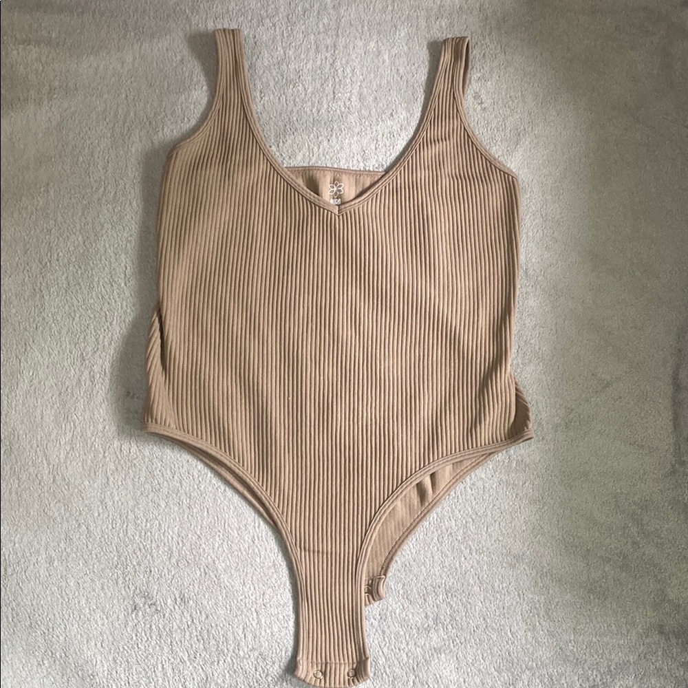 Woman’s Tan Ribbed bodysuit